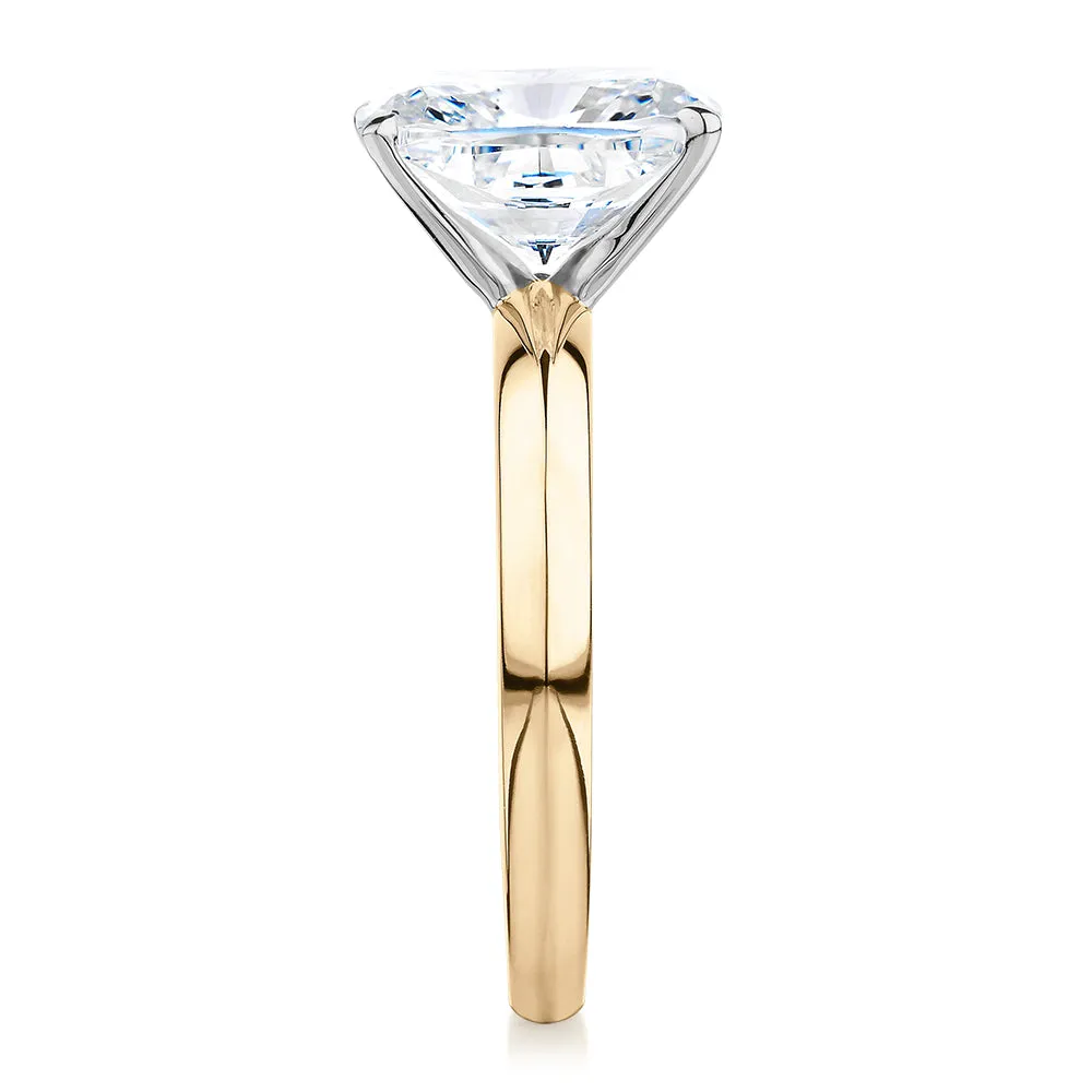 Cushion Radiant solitaire engagement ring with 3.49 carat* diamond simulant in 14 carat yellow and white gold