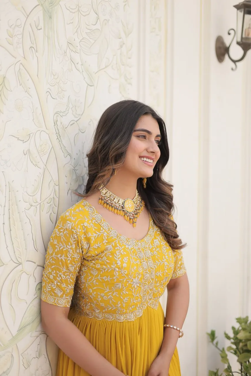 Luxurious Zari-Embroidered Yellow Gown for Discerning Women