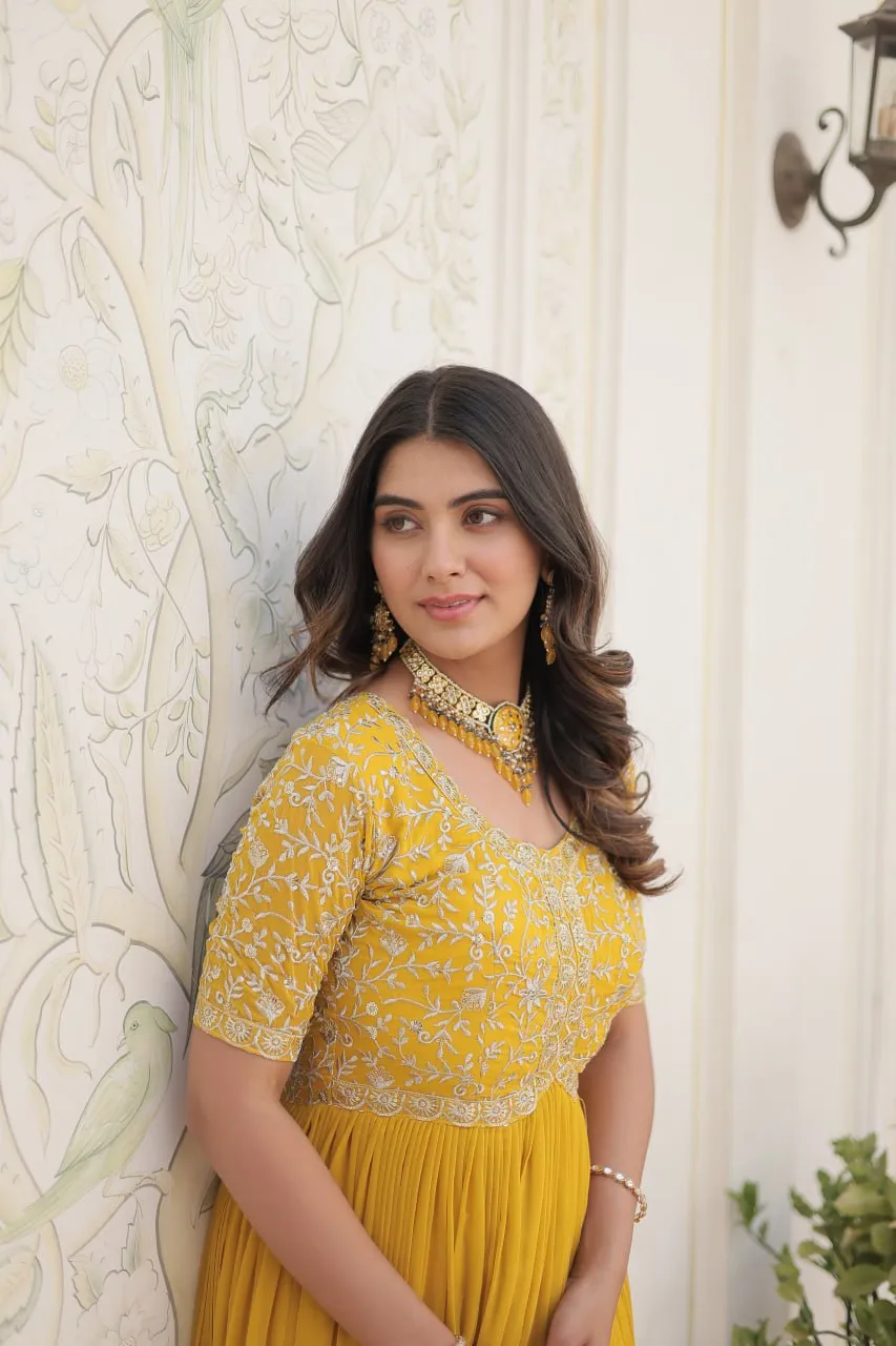 Luxurious Zari-Embroidered Yellow Gown for Discerning Women